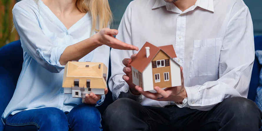 Building versus Buying a House